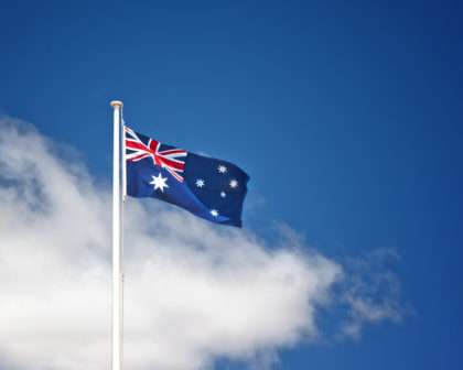 An image of the Australian flag in the summer wind