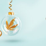 gold cannabis leaf inside clear ornament